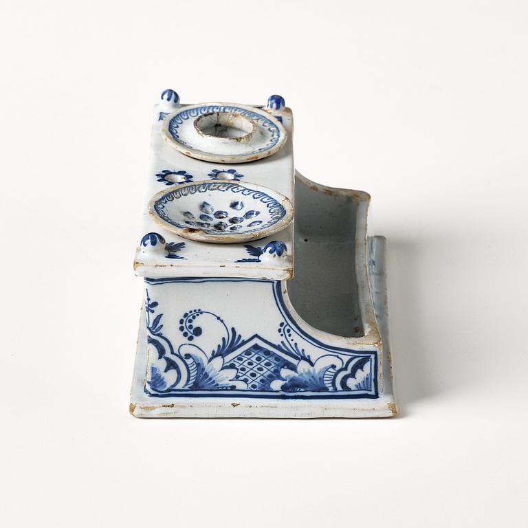 A Swedish Rörstrand faience desk set, dated Stockholm 22/11 1745.