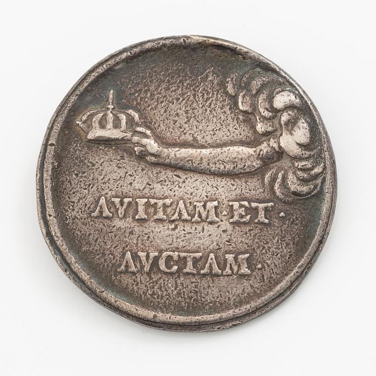 Kastpenning, Drottning Kristinas kröning 1650, av Erich Parise (medaljgravör under 1600-talets mitt).