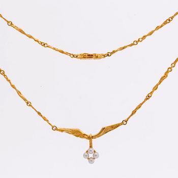 LAPPONIA, parure, 18K gold and cultured pearls approx 3 mm, design Björn Weckström 1999, certificate and original box.