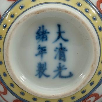 A set of eleven famille rose ba jixiang wine cups, Qing dynasty, with Guangxu six character mark and period (1874-1908).