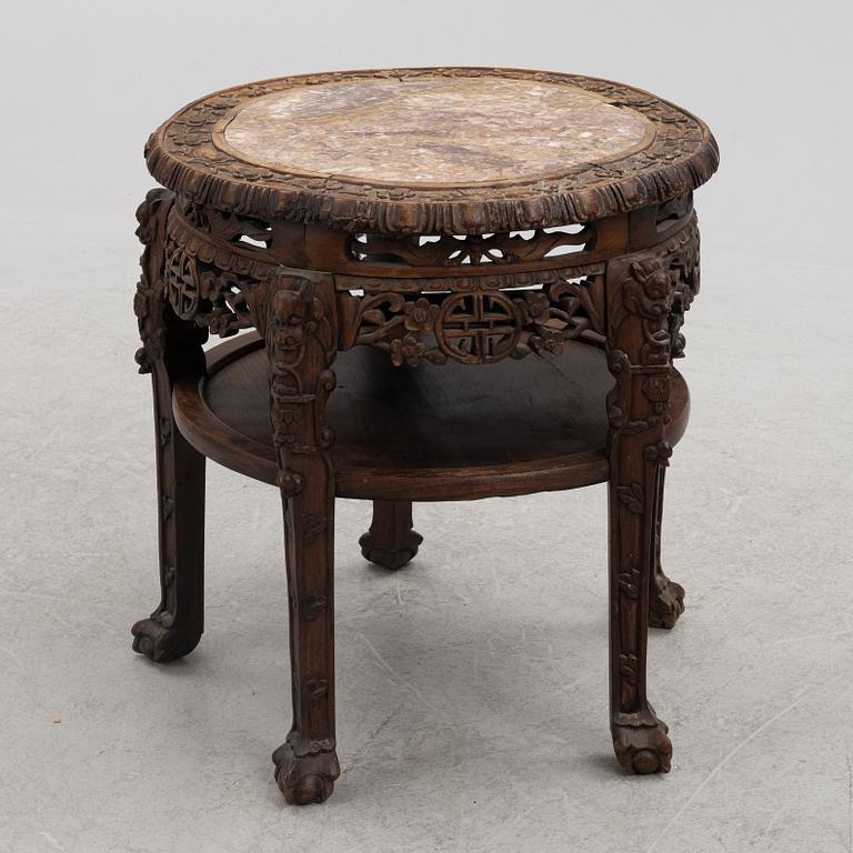 A Chinese hardwood table, around 1900.