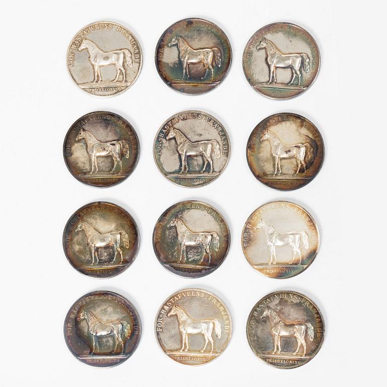 Twelve silver medals, Kungliga Myntverket, Sweden, early 20th century.