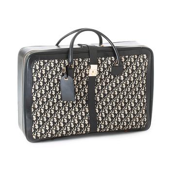 342. CHRISTIAN DIOR, a black monogram canvas suitcase.