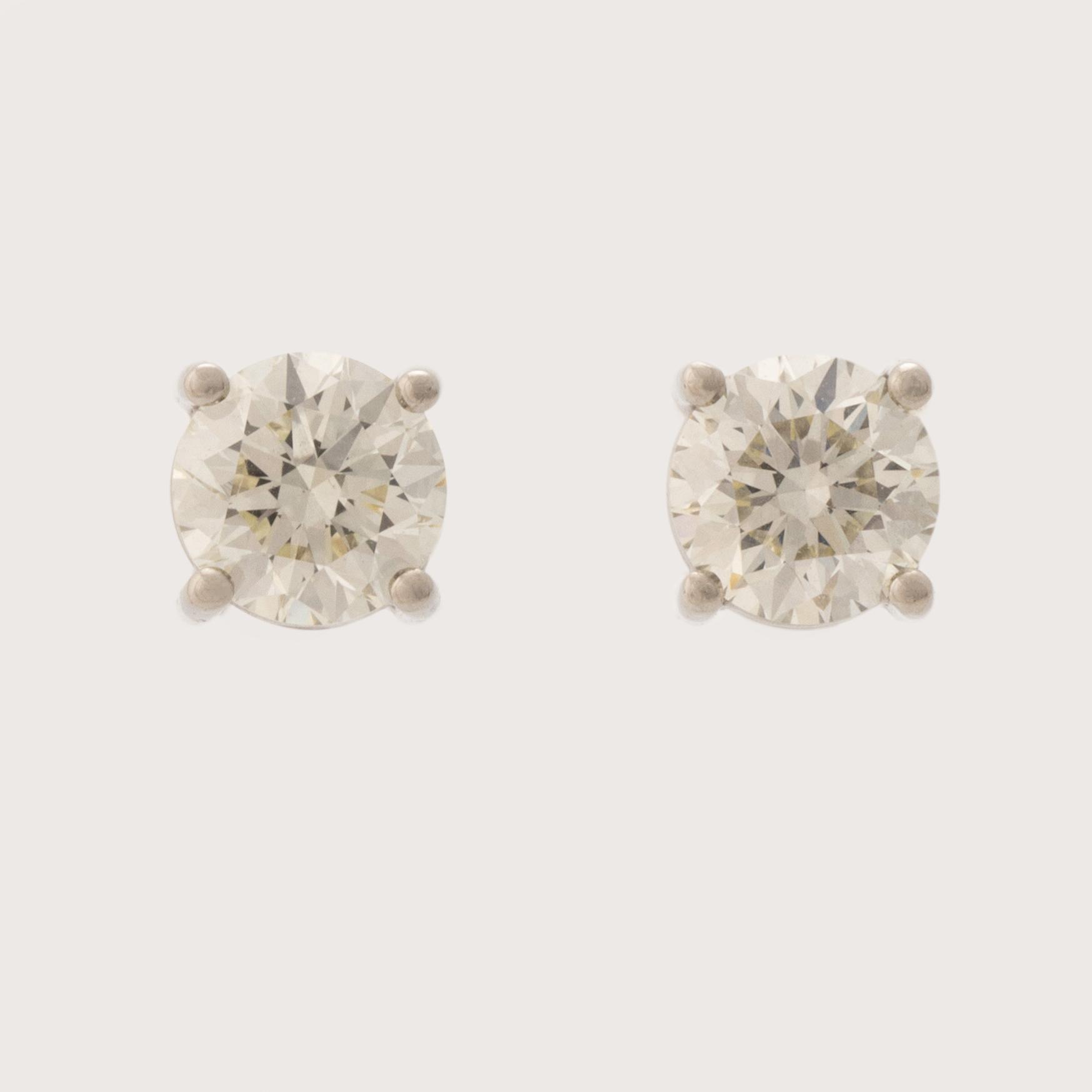 Brilliant cut diamond earrings.