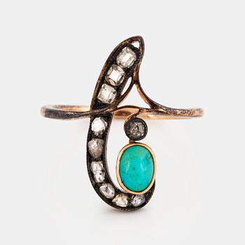 1128. A 14K gold and silver Fedor Lorie ring set with a turquoise and old-cut diamonds.