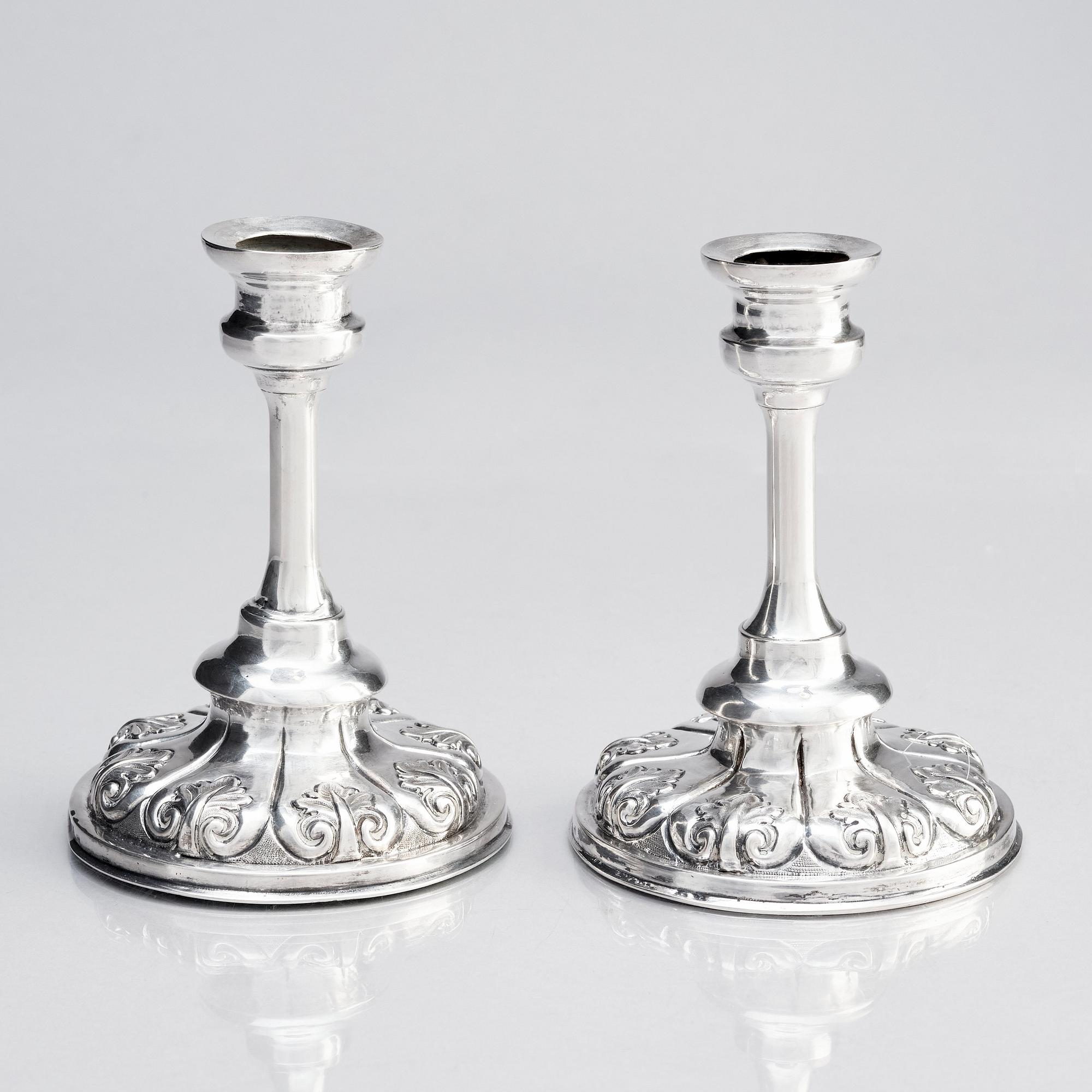 Ljusstakar, silver, ett par, otydlig mästarstämpel, möjligen Olof Pehr Hallberg, Norrköping (verksam 1832-1862).