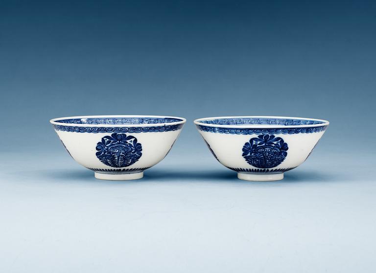 A pair of blue and white bowls, Qing dynasty, Yongzheng (1723-35), with Xuande four character mark.