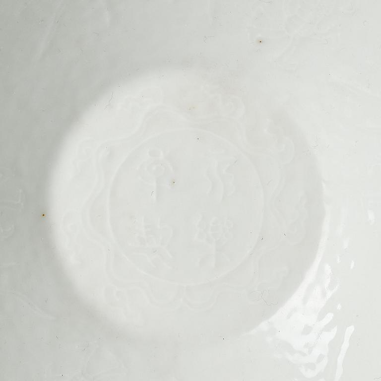 A white-glazed anhua 'dragon' bowl, possibly late Qing or Republic.