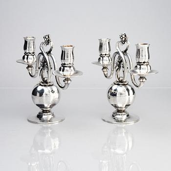 Georg Jensen, a pair of sterling silver candelabra, Copenhagen 1933-44, design nr 324.