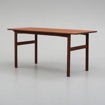 A second half of the 20th century teak vaneered coffee table.