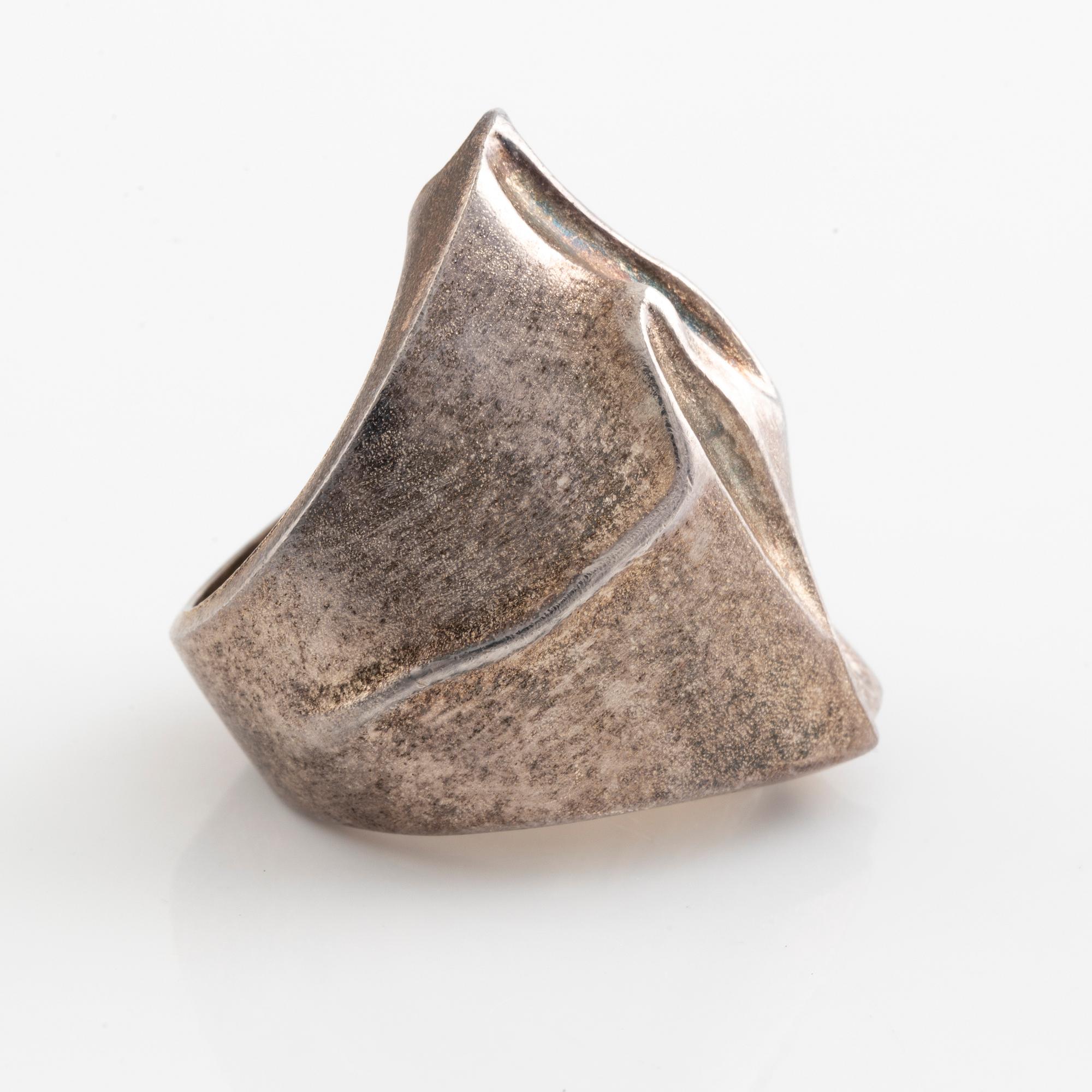 Lapponia, two sterling silver rings and tie ping.