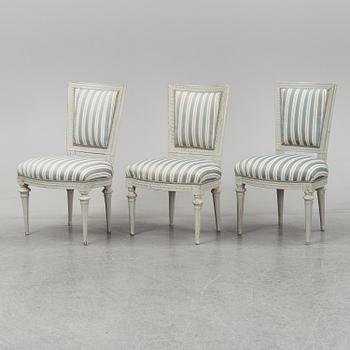 Six (3+2+1) late 18th century Gustavian chairs.