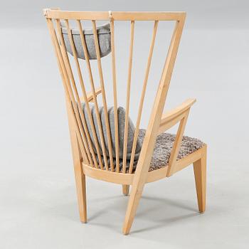 An Norrgavel armchair by Nirvan Richter named "Länstol".