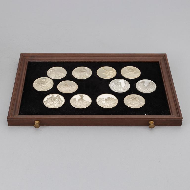 A set of 50 Sterling silver medals from Franklin Mint.
