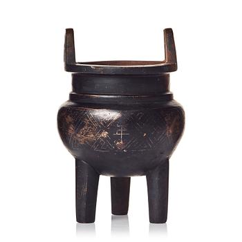 729. A tripod bronze censer, Qing dynasty (1664-1912).