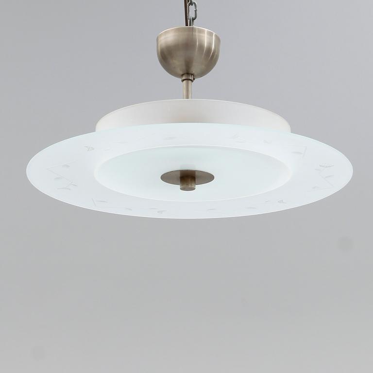 TAKLAMPA, 1900-talets mitt.