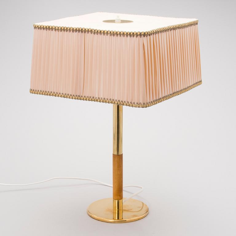 A mid 20th century '9206' table lamp for Taito Finland.