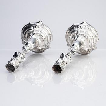 A pair of Swedish Rococo silver candlesticks, marks of Abraham Lundberg, Stockholm 1765.