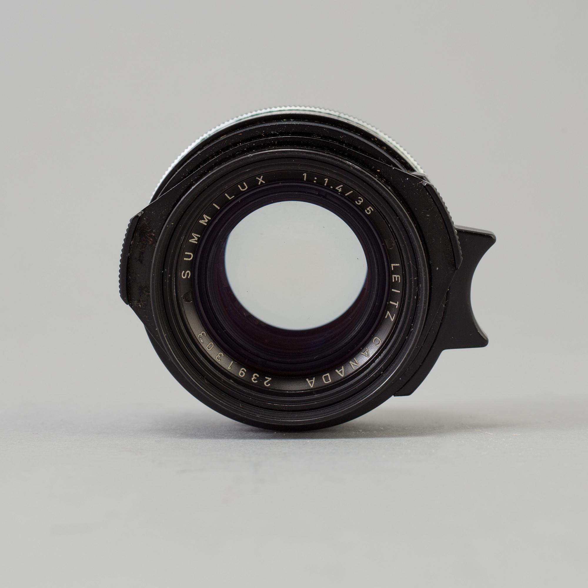 A black Leica Summilux 1:1.4 /35 Leitz  Lens no 2391303, Canada.