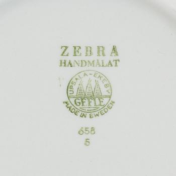 A 12 part earthenware service "Zebra" designed by Eugene Trost for Gefle, in production 1855-67.