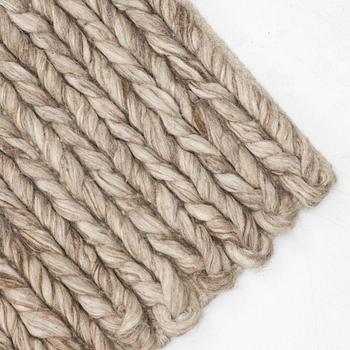 A monochrome carpet, "Chunky wool sand", Lotta Agaton Interiors x Layered, c 400 x 300 cm.