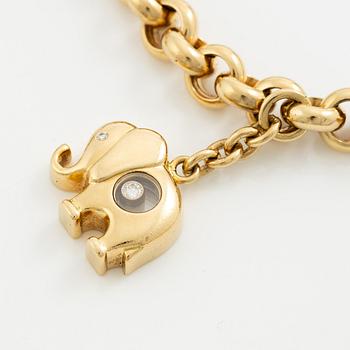 Chopard armband med berlocker 18K guld med runda briljantslipade diamanter.