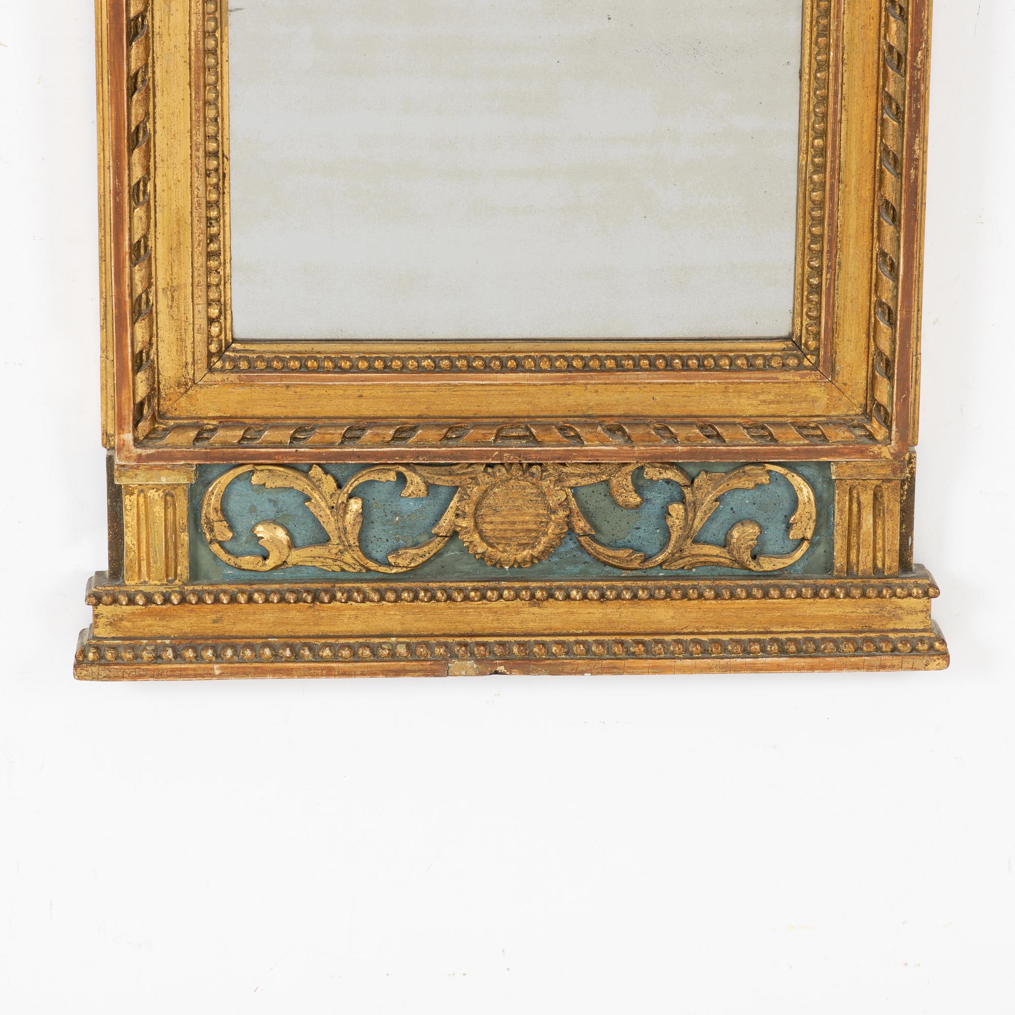 A late Gustavian mirror, circa 1800.