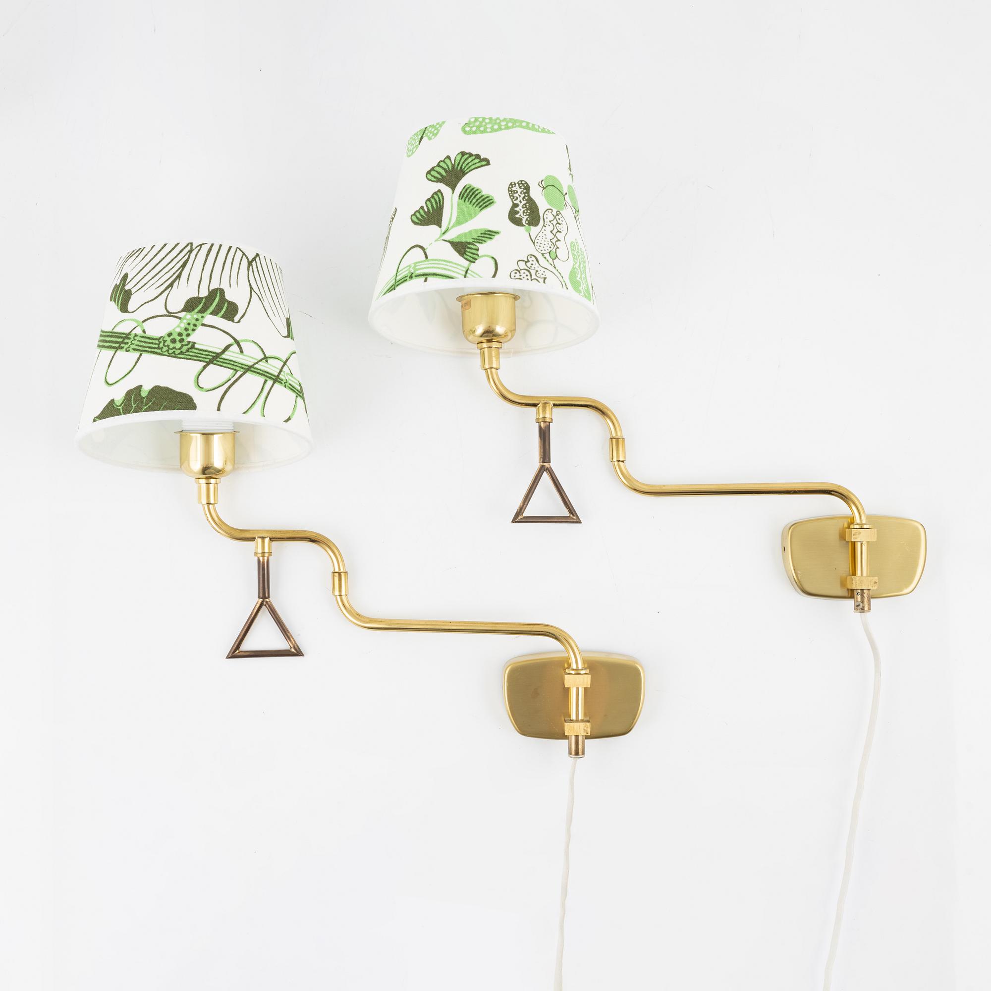 A pair of brass wall lights,  second half of the 20th century.