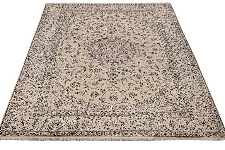 A Nain Part Silk carpet, c. 295 x 205 cm.
