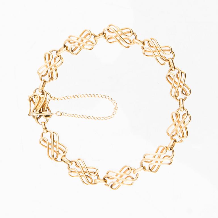 Armband 18K guld Stockholm 1956 fantasilänk.