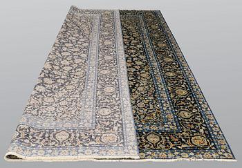 A carpet, Kashan signed, ca 395 x 277 cm.