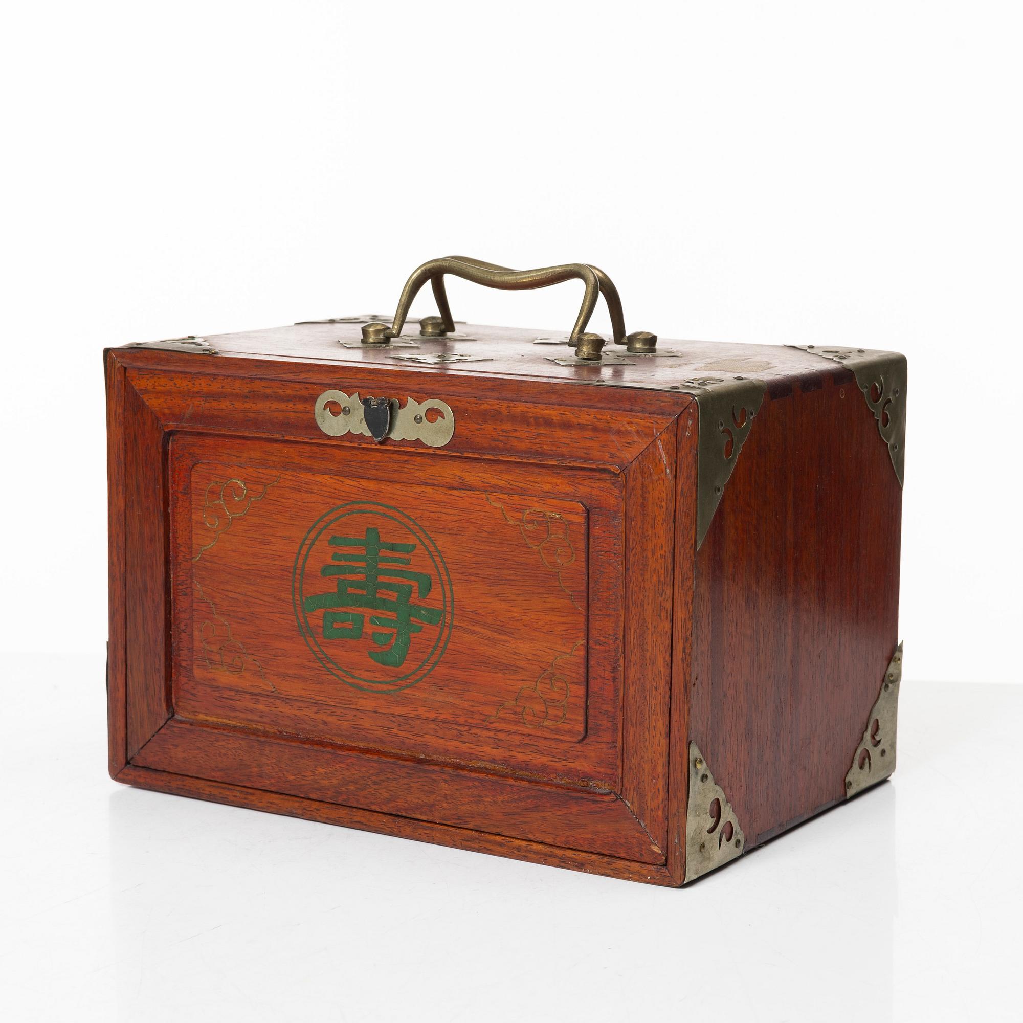 A Mahjong game in a hardwood box, China, first half of the 20th century.