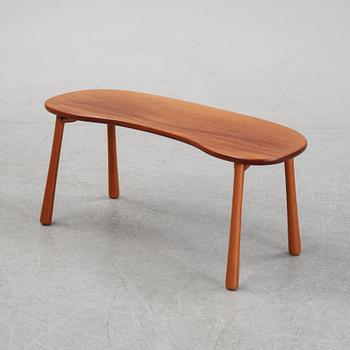 A model 1034 stool by Josef Frank for Firma Svenskt Tenn.