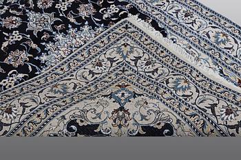 A carpet, Nain, part silk, ca 212 x 153 cm.