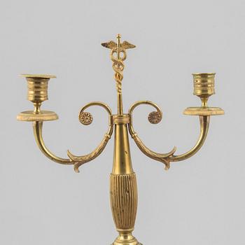 A pair of brass candelabra, first half/mid 19th century.