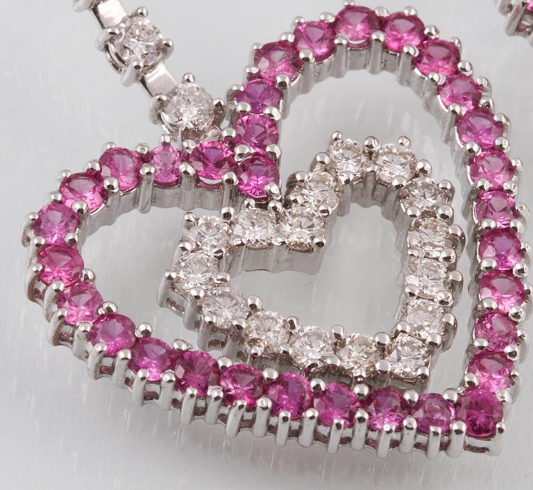 ÖRHÄNGEN, 18K vitguld med briljantslipade diamanter samt rosa safirer. Vikt 22,4 gram.