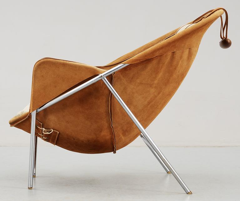An Erik Ole Jörgensen leather and chromed steel lounge chair.
