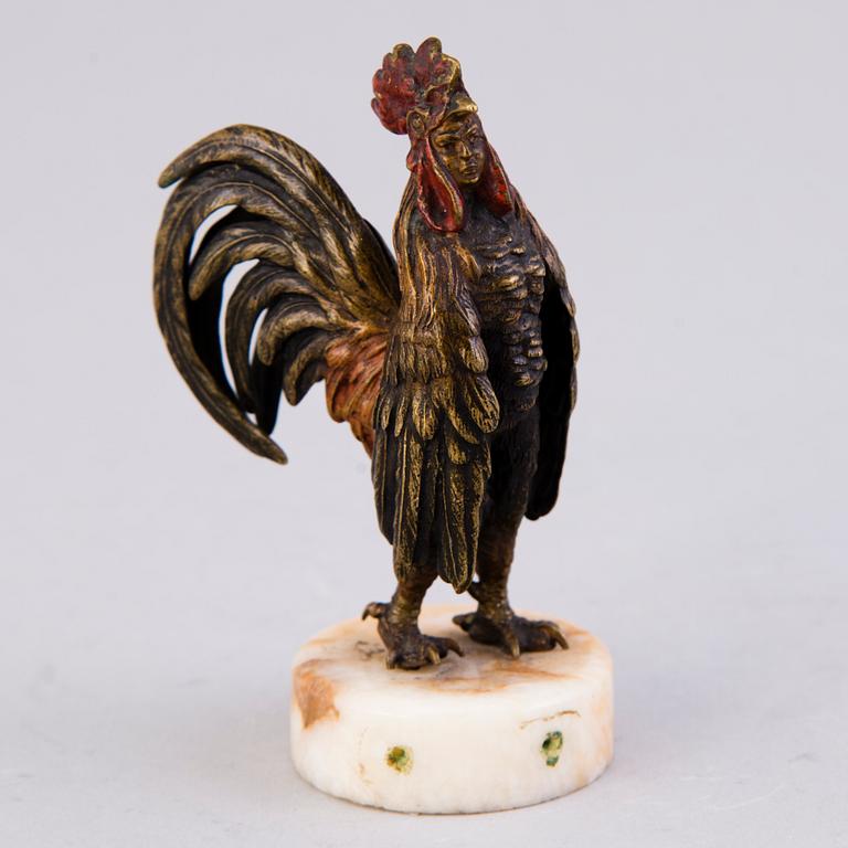 A MINIATURE SCULPTURE, painted bronze, early 20th century.