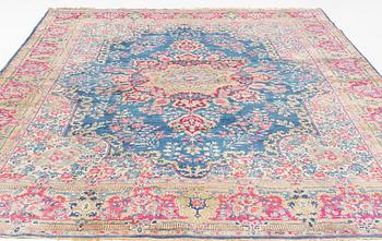 A carpet, Kerman, ca 358 x 275 cm.