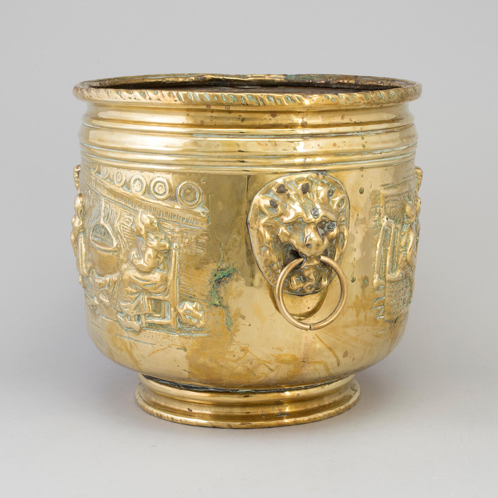 An 18th/19th century brass flower pot.