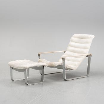 Ilmari Lappalainen, a lounge chair with ottoman, model "Pulkka" for Asko, Finland. Designed in 1968.