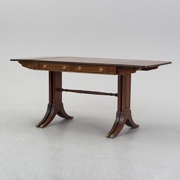 A mahogany dining table with folding and additional leaves, Nordiska Kompaniet, designed 1945.