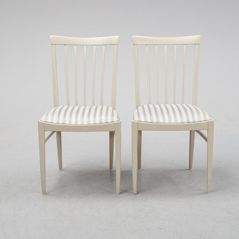 A dining table and six chairs by Carl Malmsten for Bodafors.