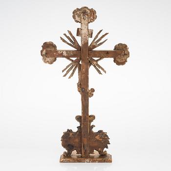 A 19th century gilded and painted wood crucifix.