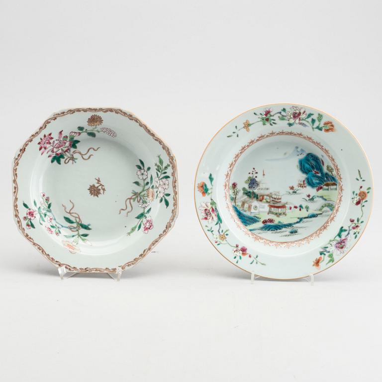 A swt of two Chinese porcelain famille rose plates and a Kanton mugg.