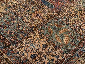 A CARPET. An old Kerman. 521 x 356 cm.