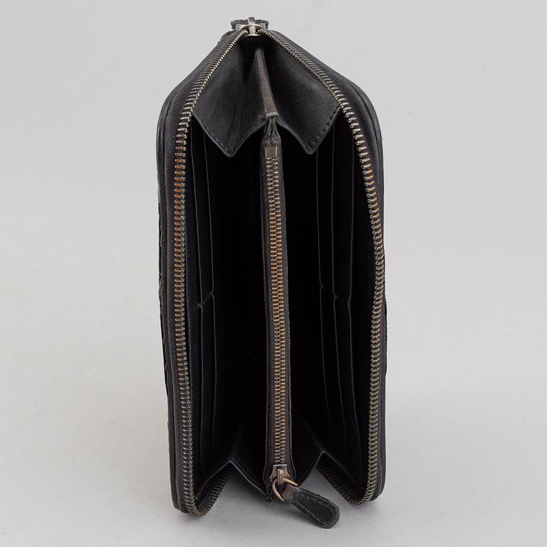Bottega Veneta, a wallet and bracelet.
