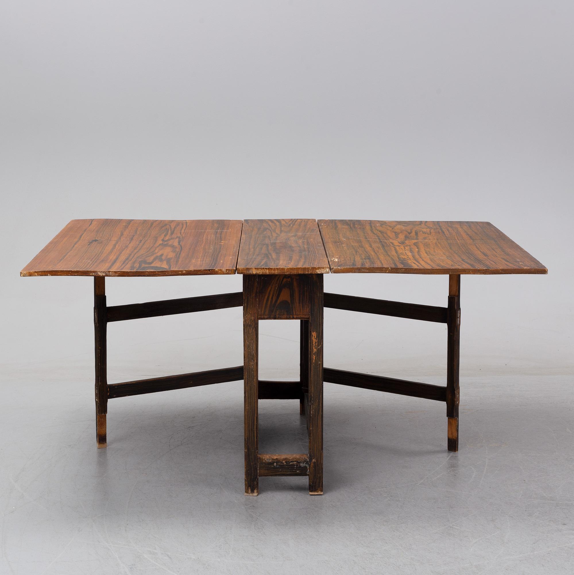 A 19th Century painted gate leg table.