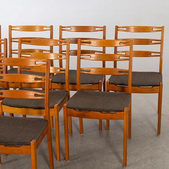 Eight 1960's oak chairs.