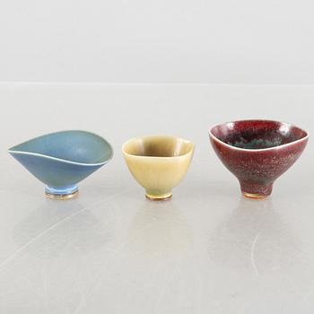 Berndt Friberg, a set of four stoneware miniature vases and three bowls, Gustavsberg Studio.